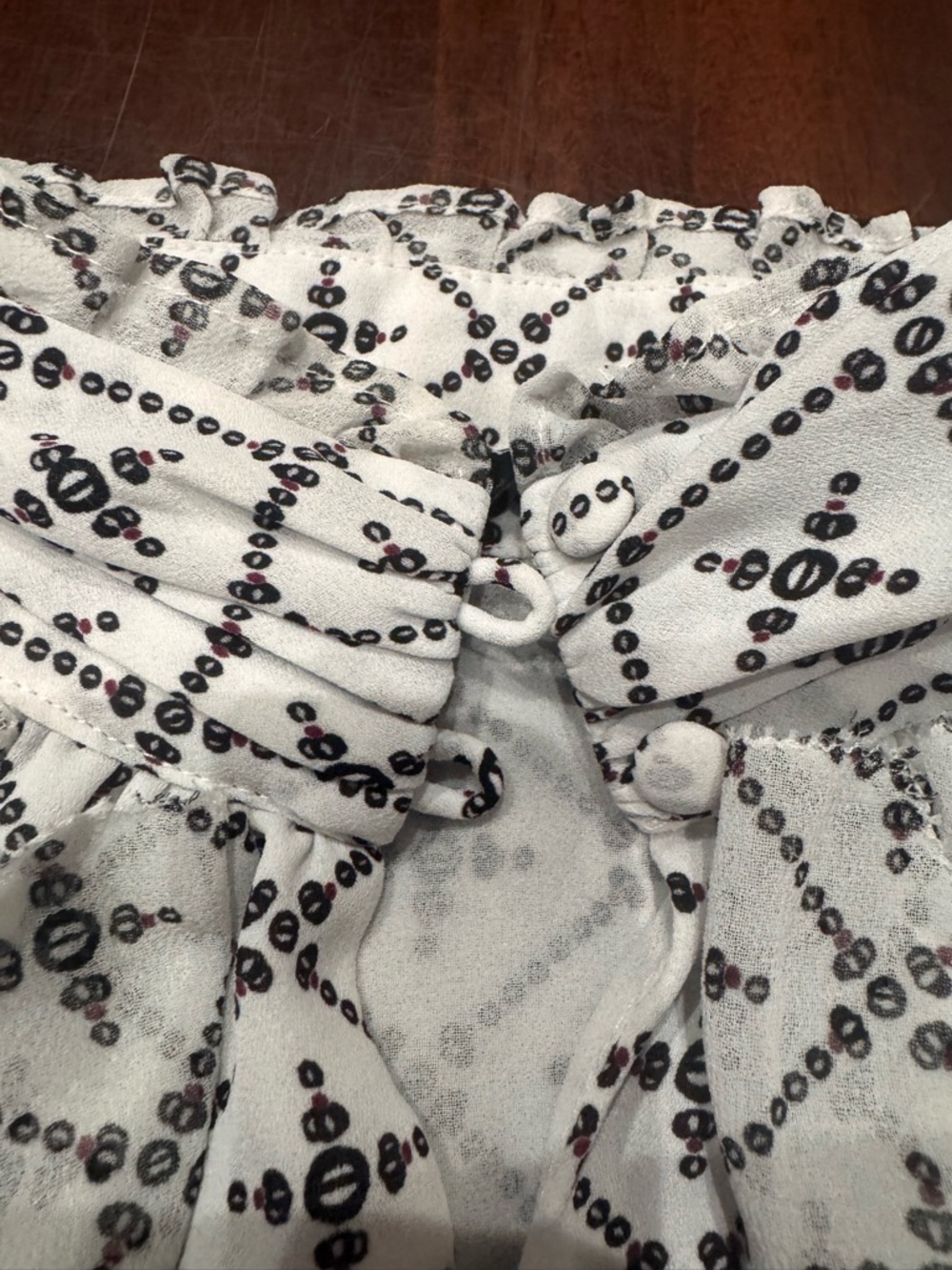 White House Black Market Black & White Geometric Ruffled Sleeveless Blouse - Picture 4 of 9
